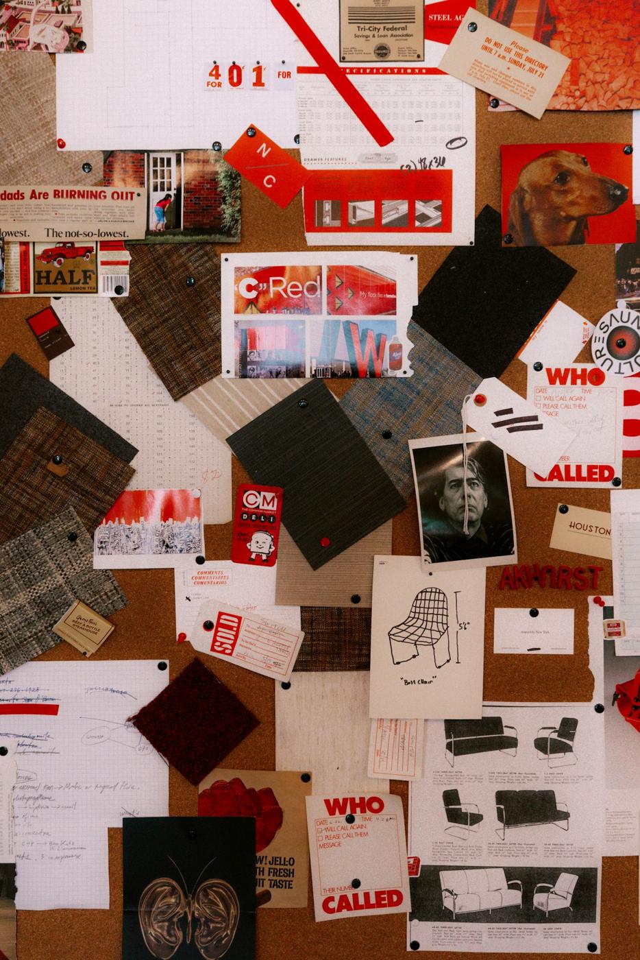 A moodboard of printed references and swatches